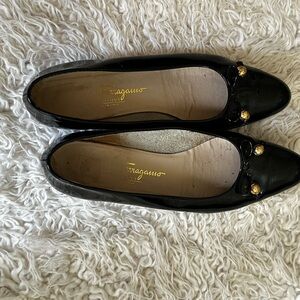 Salvatore Ferragamo Black Flats with Gold Accents